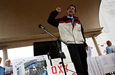 Larry Golbom of Florida speaks at a rally in Abingdon, Va., against the company that made and marketed OxyContin.